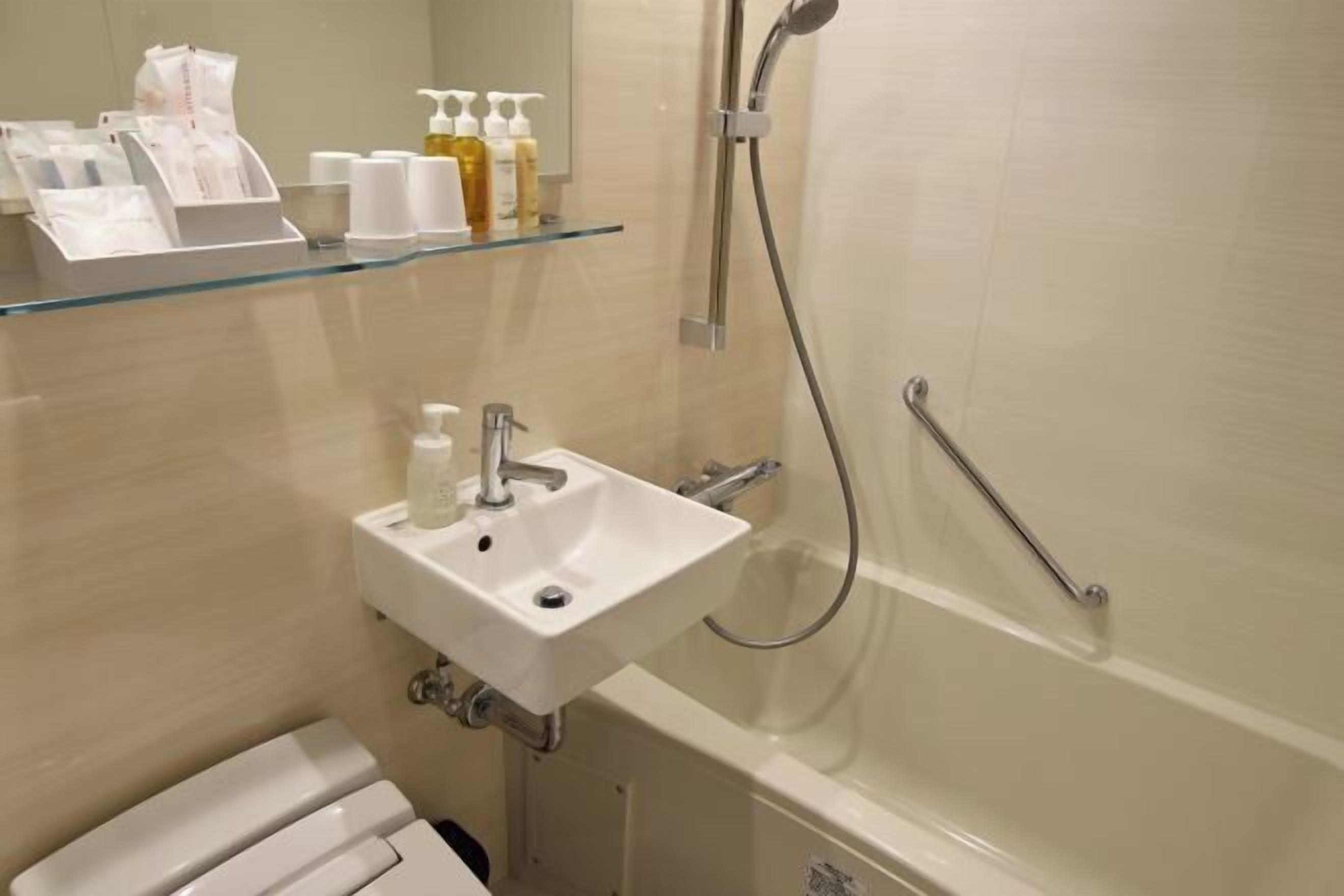 Free toiletries, hair dryer, slippers, bidet