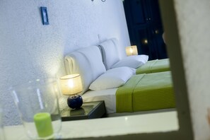 Suite familiar, vistas al mar | Caja fuerte, sistema de insonorización, wifi gratis y ropa de cama