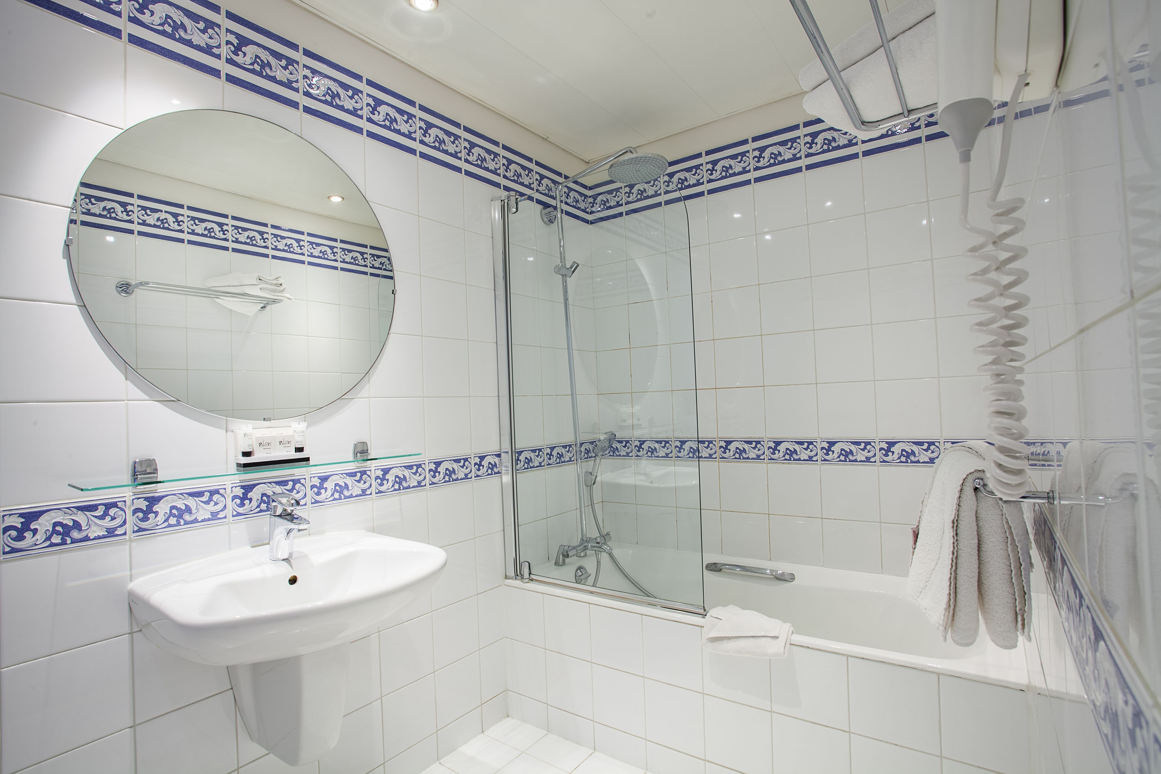 hair dryer, bathrobes, towels