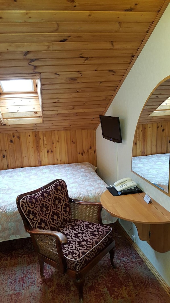 Desk, blackout drapes, soundproofing, iron/ironing board