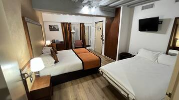 Family Quadruple Room, Accessible, Ground Floor | Minibar, in-room safe, desk, soundproofing