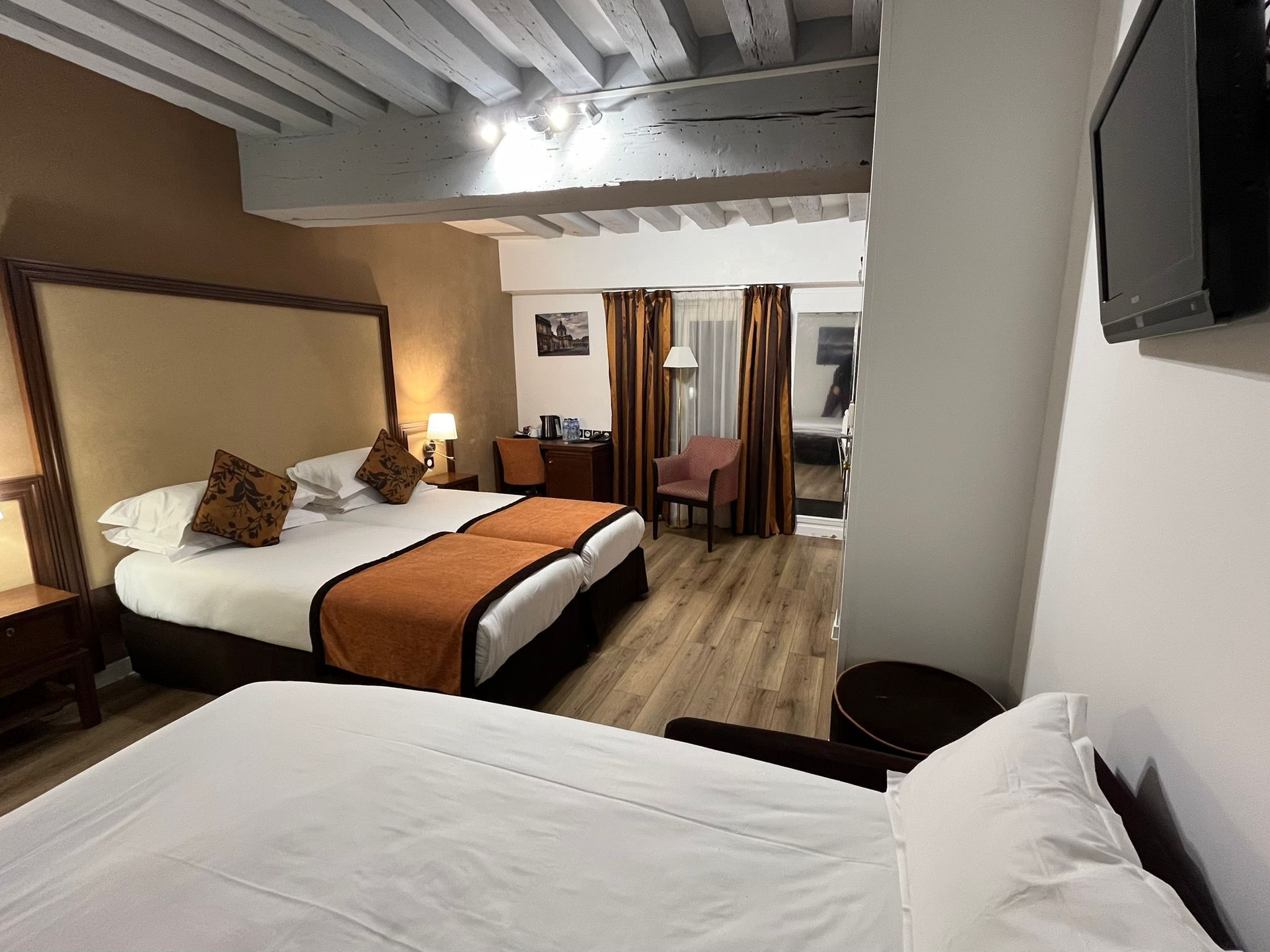 Family Quadruple Room, Accessible, Ground Floor | Minibar, in-room safe, desk, soundproofing