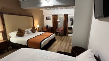 Family Quadruple Room, Accessible, Ground Floor | Minibar, in-room safe, desk, soundproofing