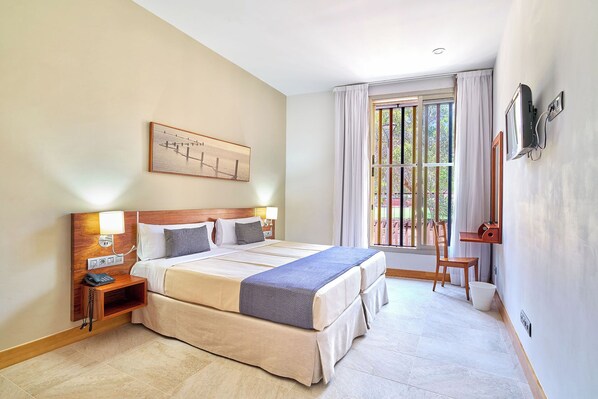 Double Room, Accessible | Minibar, desk, blackout curtains, iron/ironing board