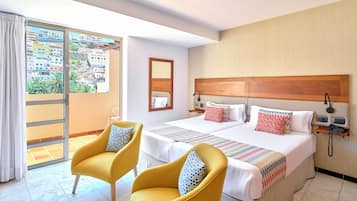 Minibar, desk, blackout curtains, iron/ironing board