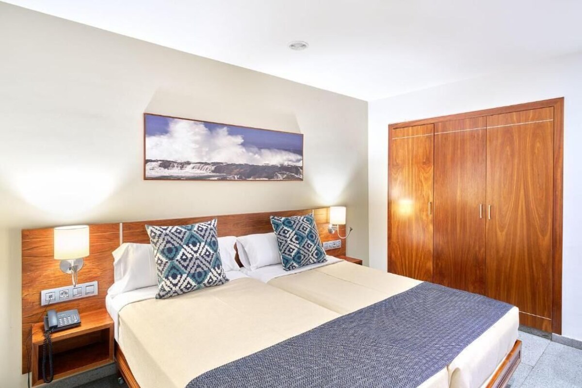Minibar, desk, blackout curtains, iron/ironing board (on request)