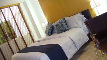 Habitación doble ejecutiva, 1 cama matrimonial | Sábanas de algodón egipcio y minibar