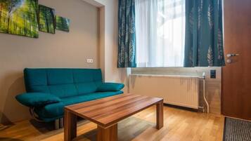 Familienapartment, 2Â Schlafzimmer, Gartenblick | Wohnbereich