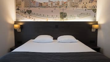 Pillow-top beds, laptop workspace, blackout curtains, soundproofing