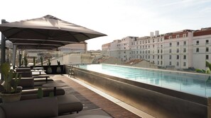 Outdoor pool, pool umbrellas, sun loungers