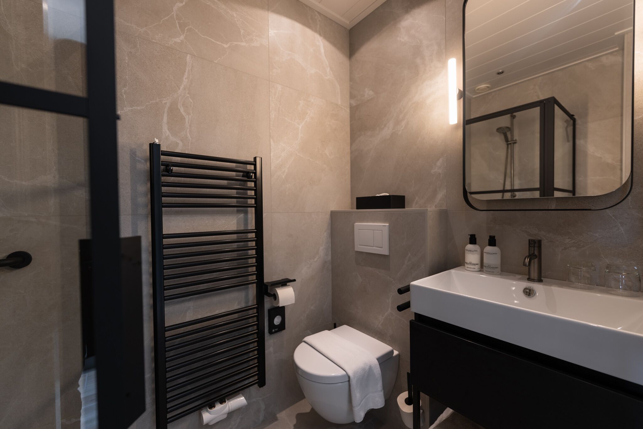 shower, free toiletries, hair dryer, towels