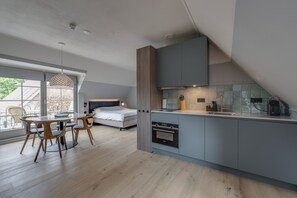 Àtic | Zona de menjador de l'habitació