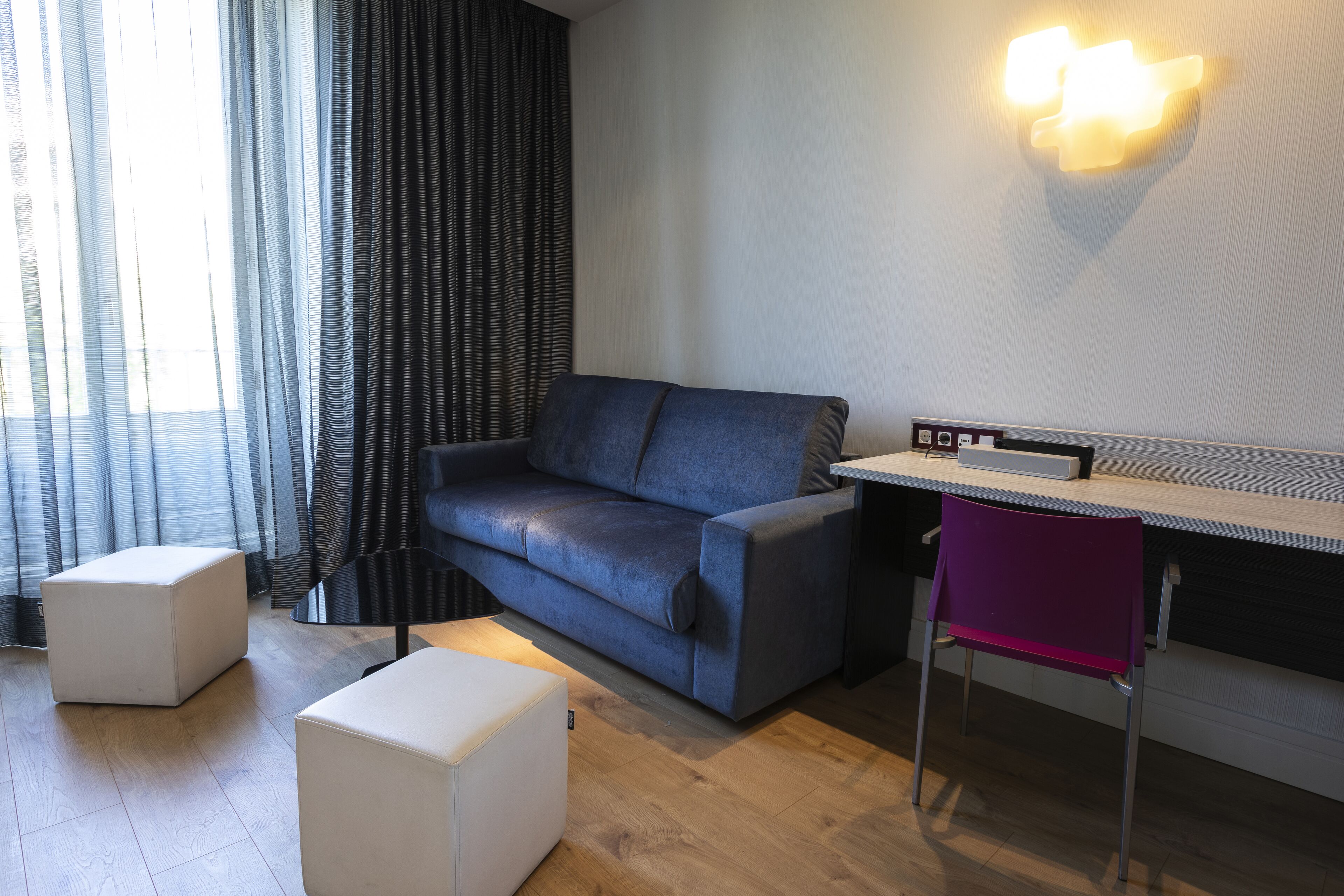 junior suite, balcony, city view | 1 bedroom, minibar, in-room safe, individually furnished