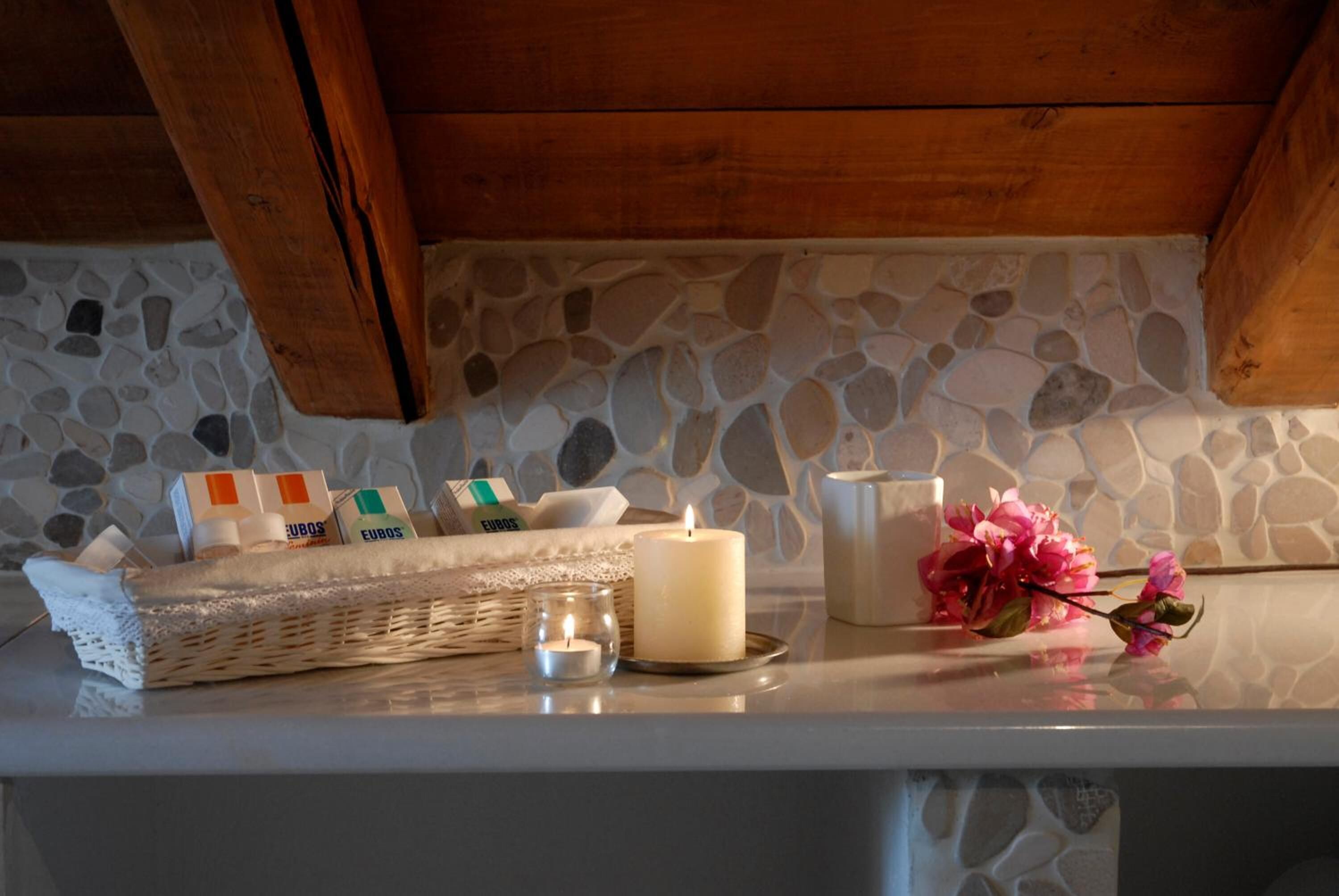 shower, designer toiletries, hair dryer, slippers