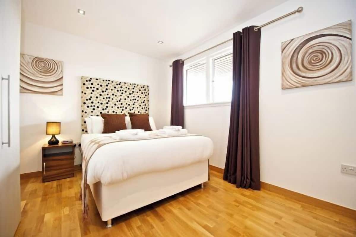 Blackout drapes, iron/ironing board, WiFi (free), bed sheets