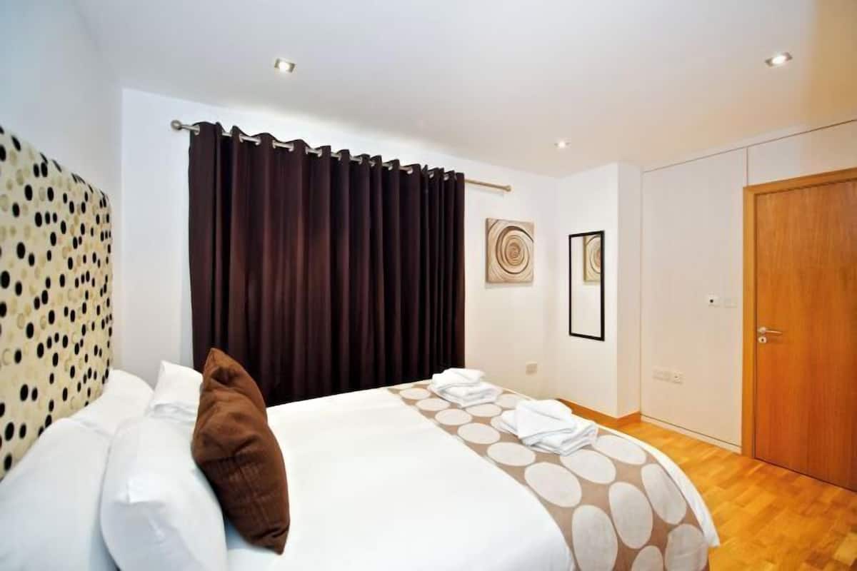 Blackout drapes, iron/ironing board, WiFi (free), bed sheets