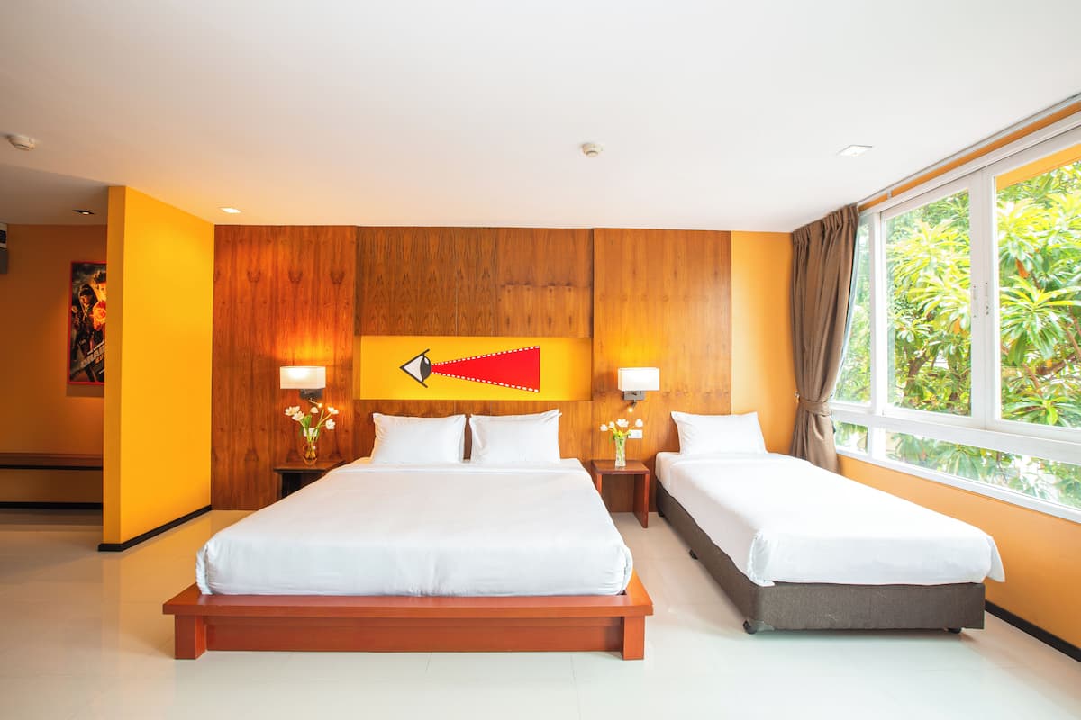 Deluxe Triple Room, Balcony | Pillow-top beds, in-room safe, desk, blackout curtains