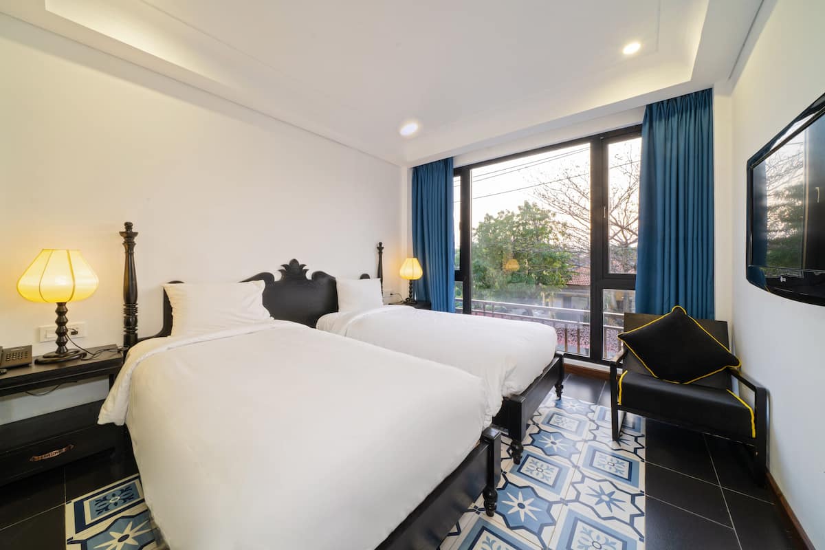 Premium bedding, down comforters, memory foam beds, minibar
