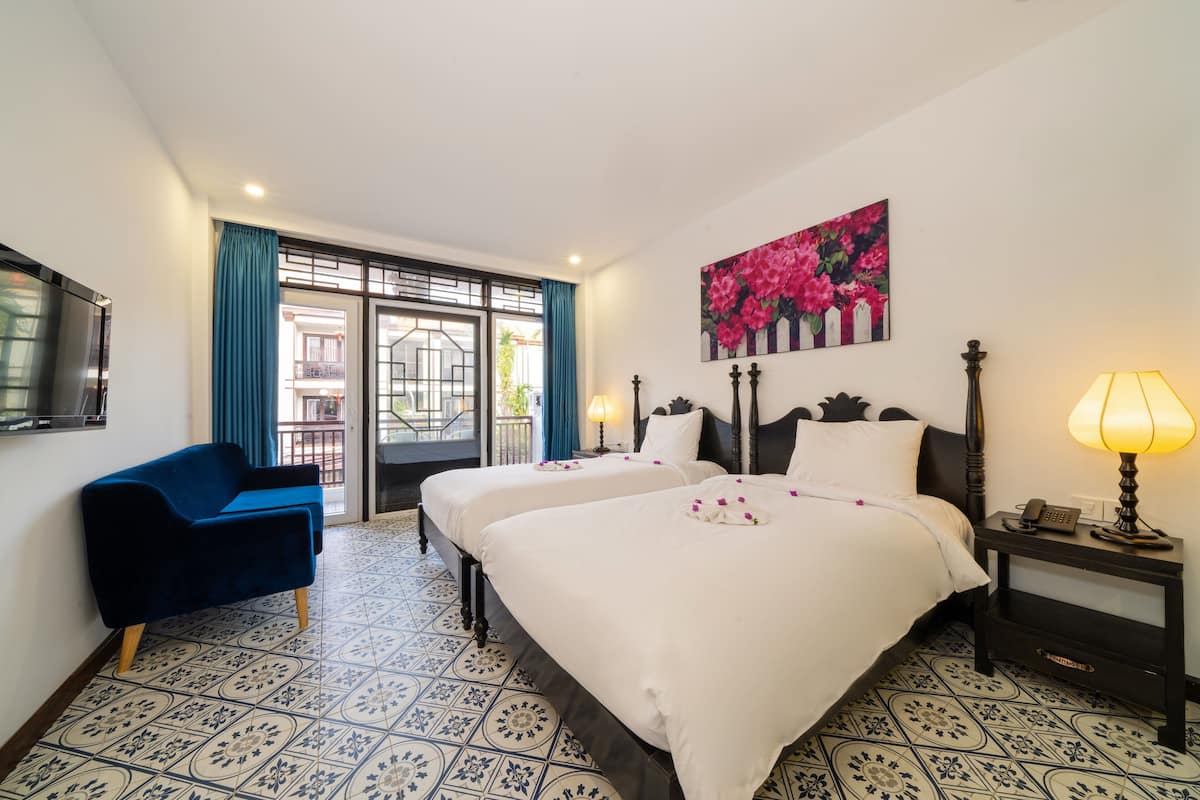 Premium bedding, down comforters, memory foam beds, minibar