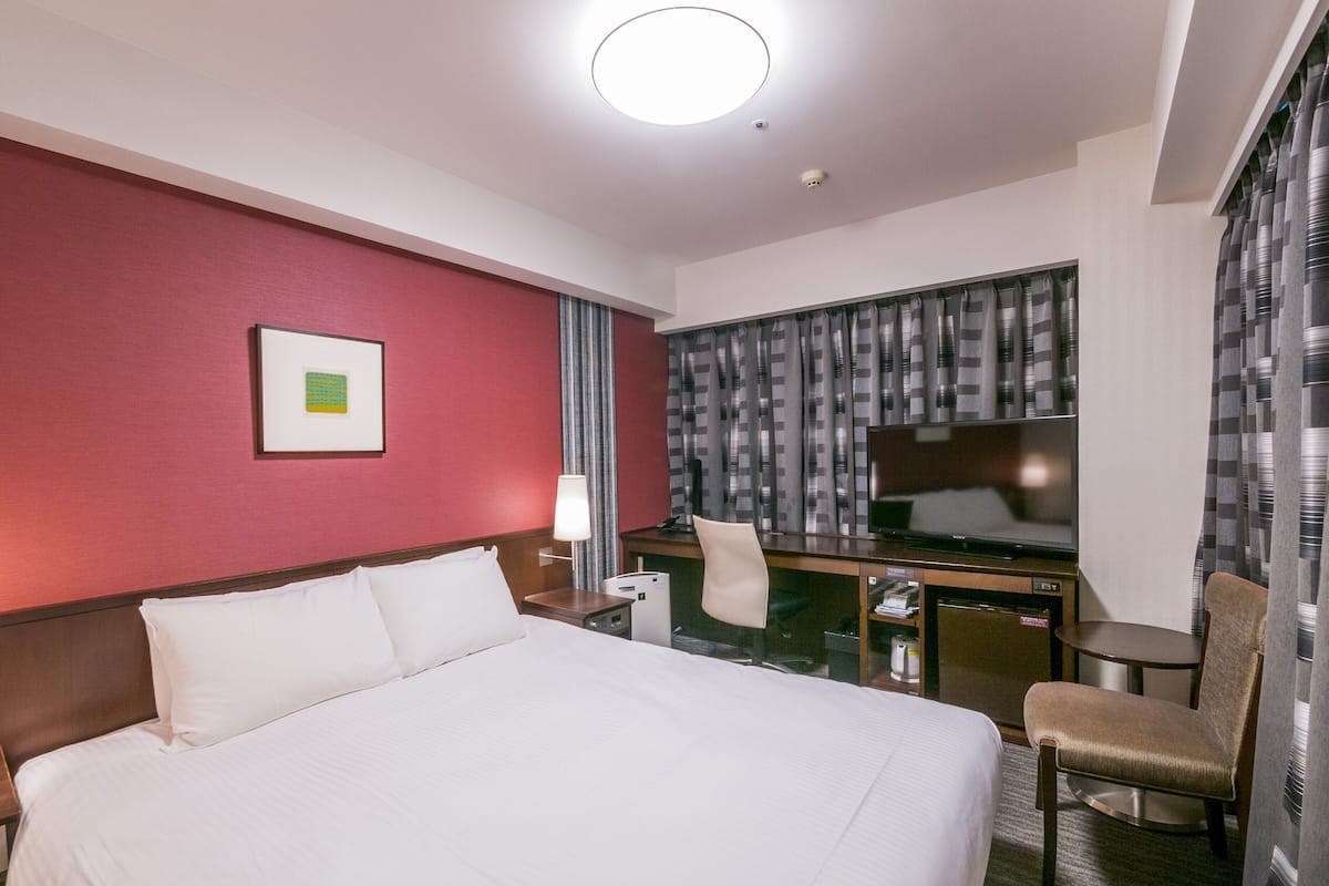 Desk, blackout curtains, free WiFi, bed sheets