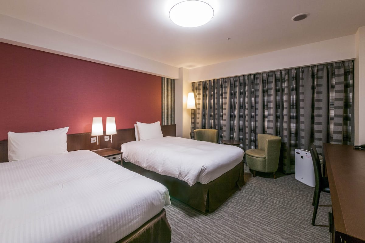 Desk, blackout curtains, free WiFi, bed sheets