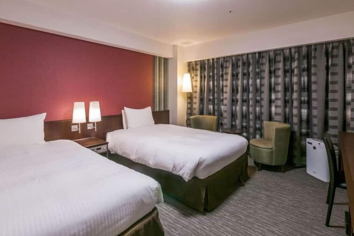 Desk, blackout curtains, free WiFi, bed sheets