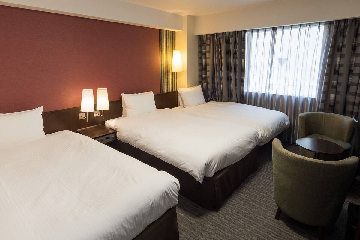 Desk, blackout curtains, free WiFi, bed sheets