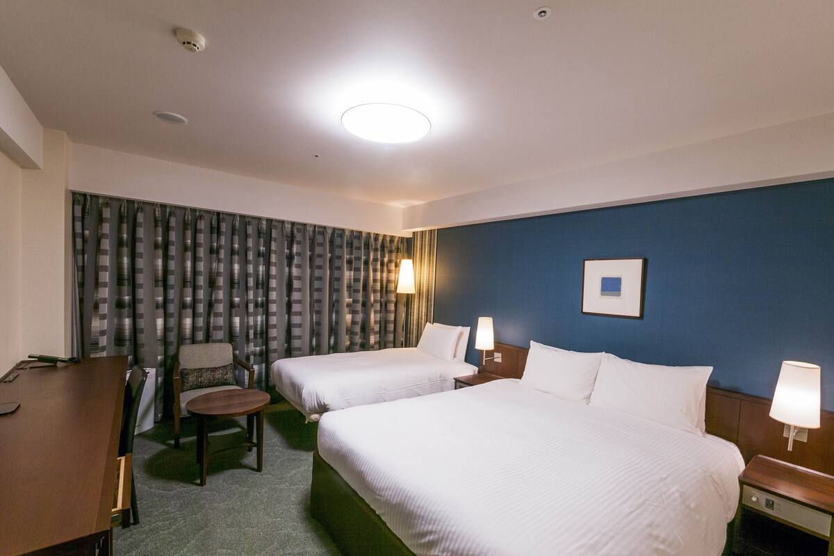 Desk, blackout curtains, free WiFi, bed sheets