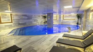 Indoor pool, open noon to 10:00 PM, free cabanas