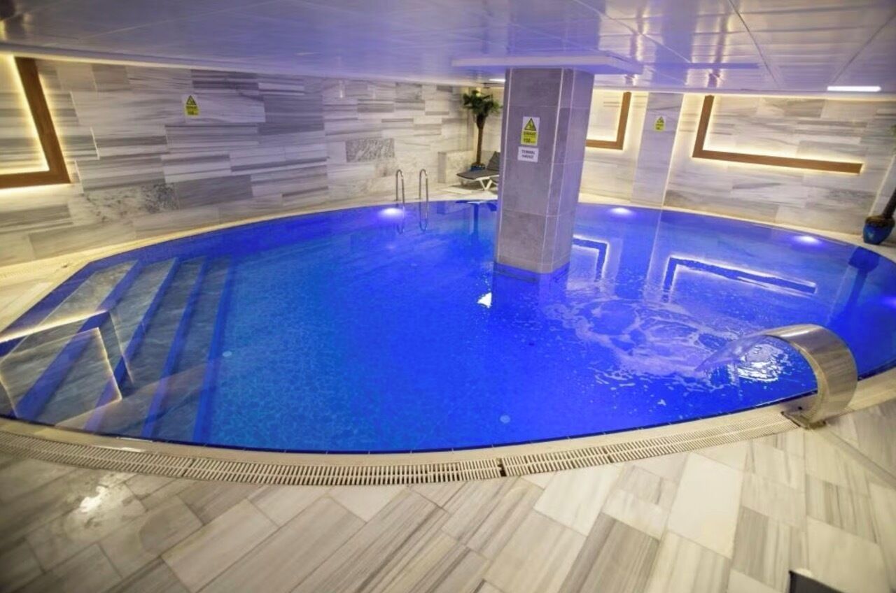 Indoor pool, open noon to 10:00 PM, free pool cabanas