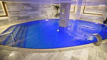 Indoor pool, open noon to 10:00 PM, free pool cabanas