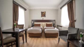 Ropa de cama de alta calidad y minibar