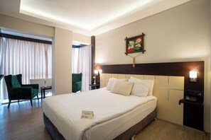 Premium bedding, minibar, in-room safe, desk