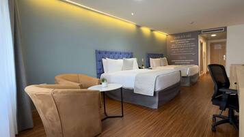 Ropa de cama de alta calidad y minibar