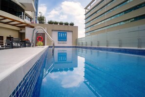 Outdoor pool, sun loungers