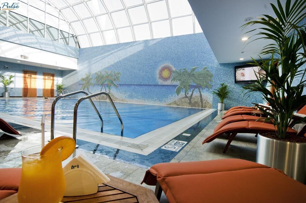 indoor pool, open 8:00 am to 8:00 pm, pool loungers