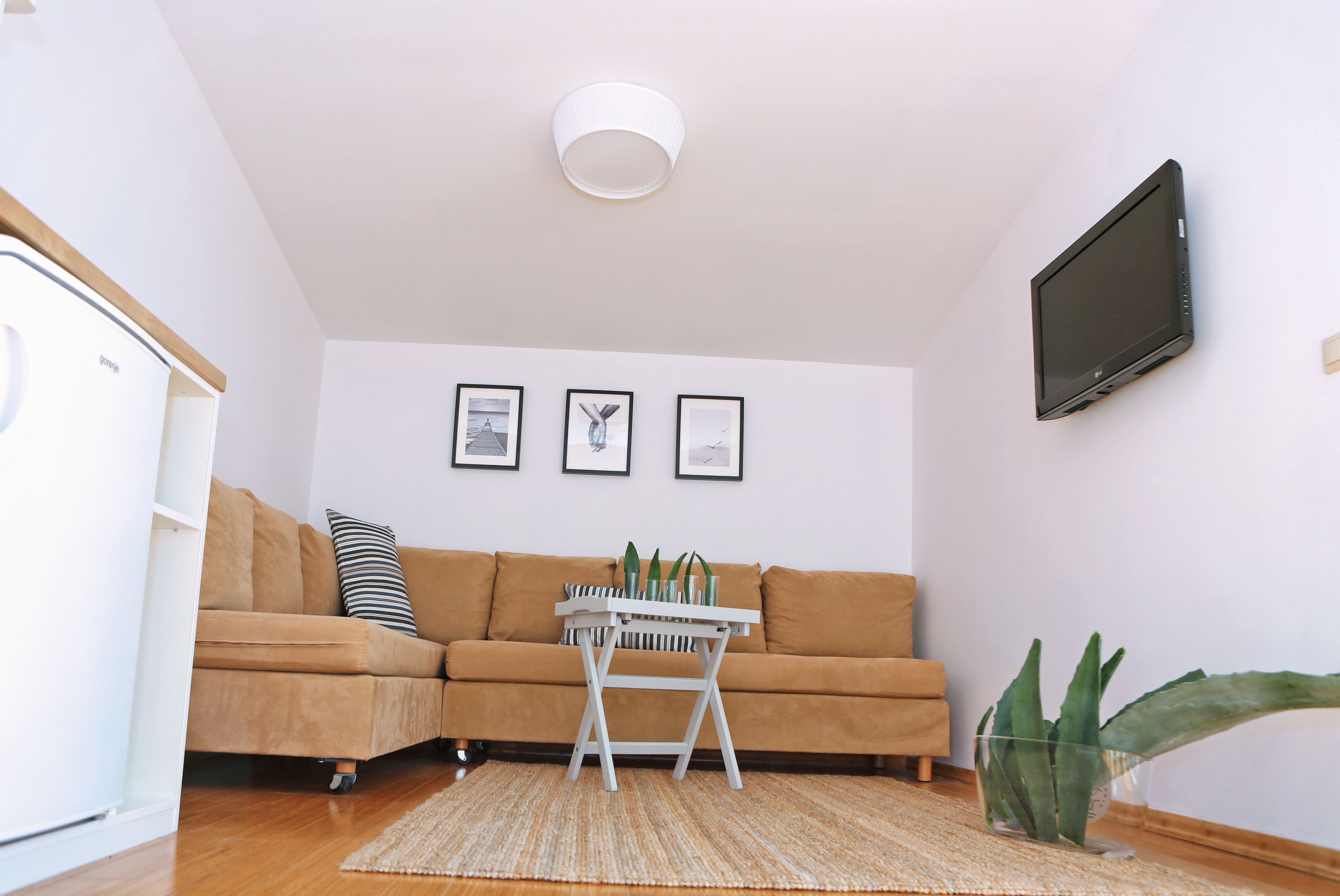 superior suite, 1 bedroom, balcony, sea view | living area | 32-inch lcd tv with satellite channels, tv