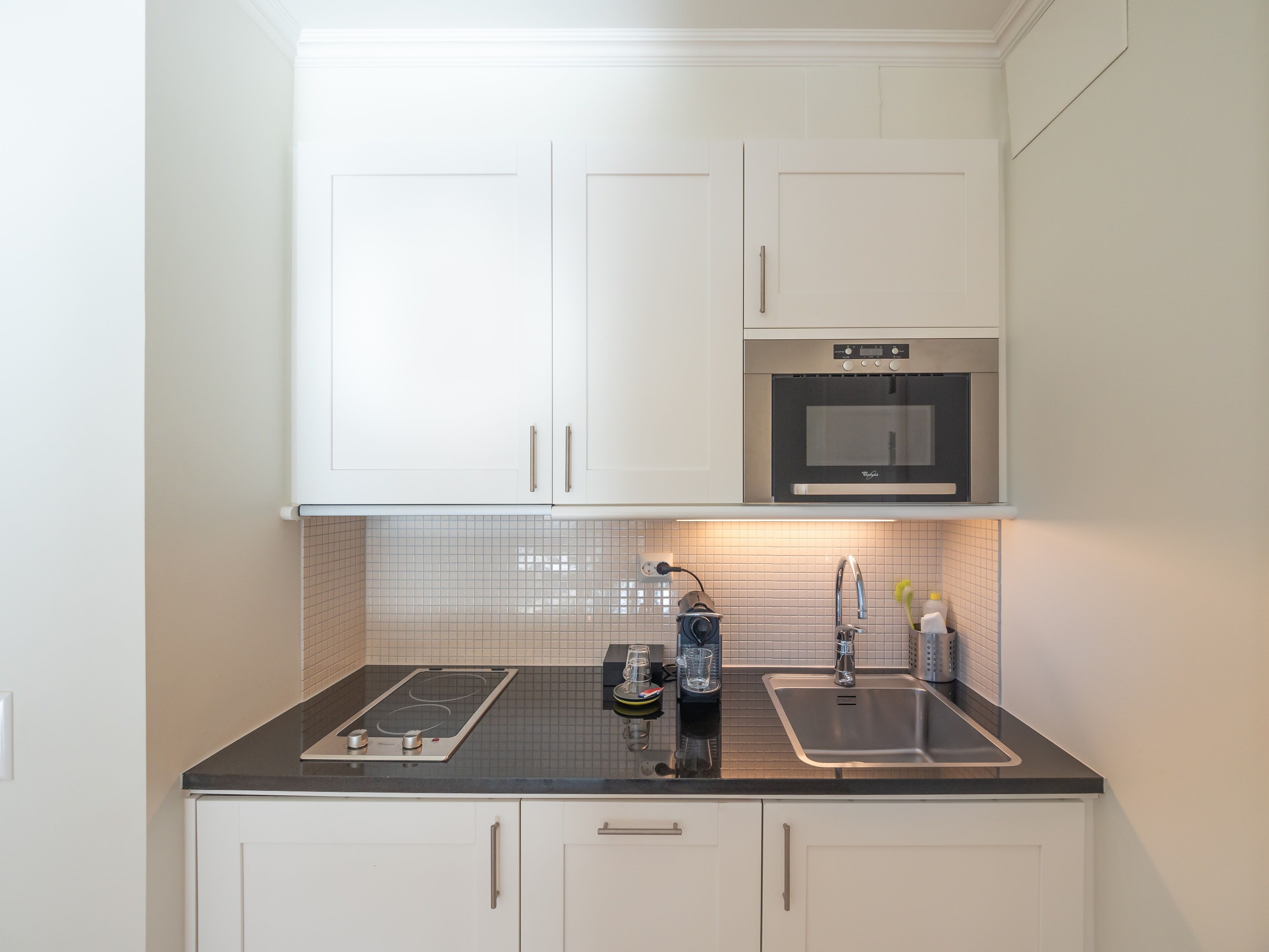 family quadruple room, 1 bedroom, courtyard view | private kitchenette | espresso maker