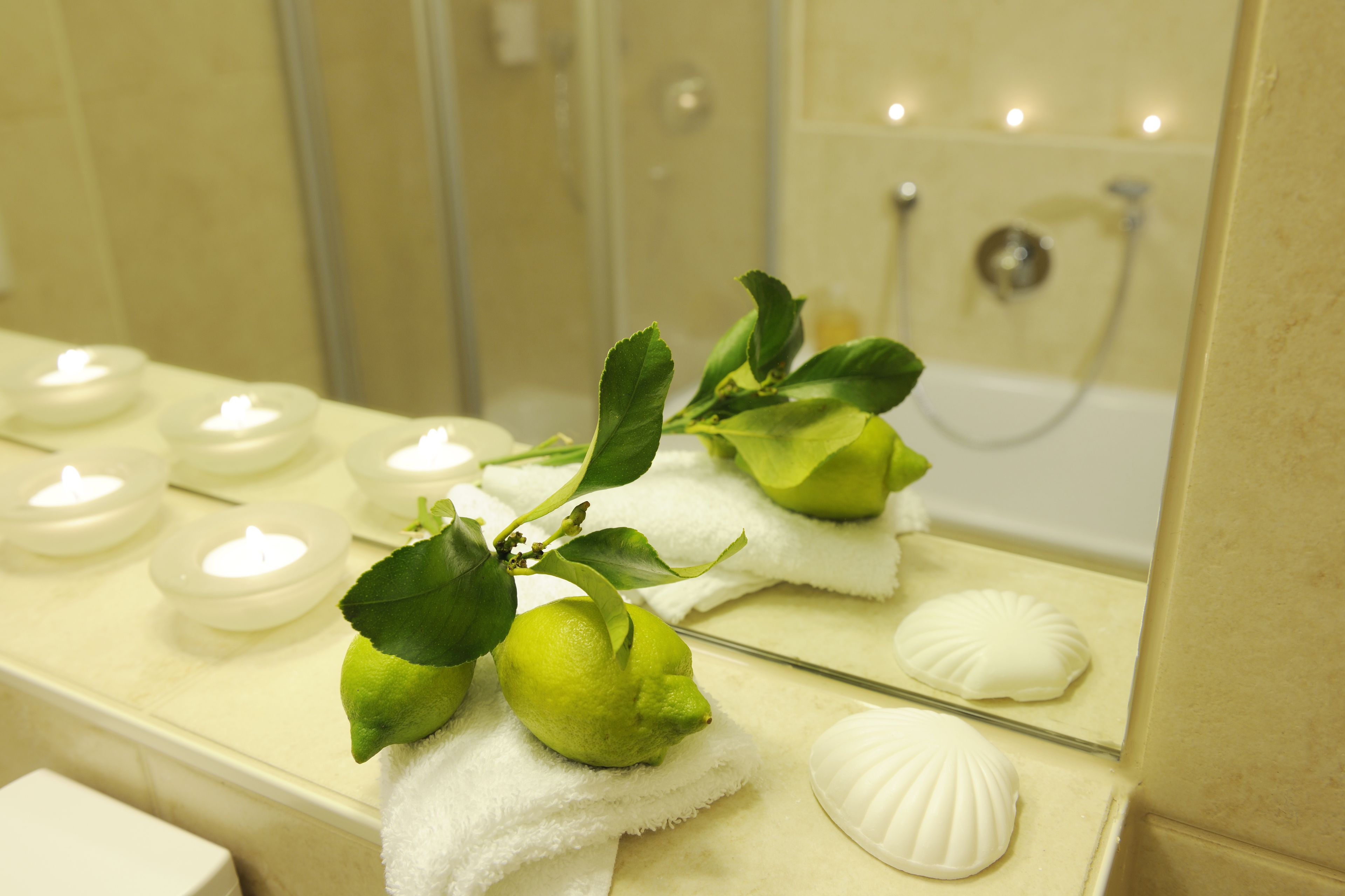 junior studio suite | bathroom | shower, hair dryer, towels