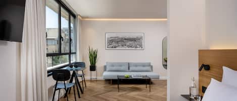 Deluxe Suite | 1 bedroom, premium bedding, in-room safe, desk