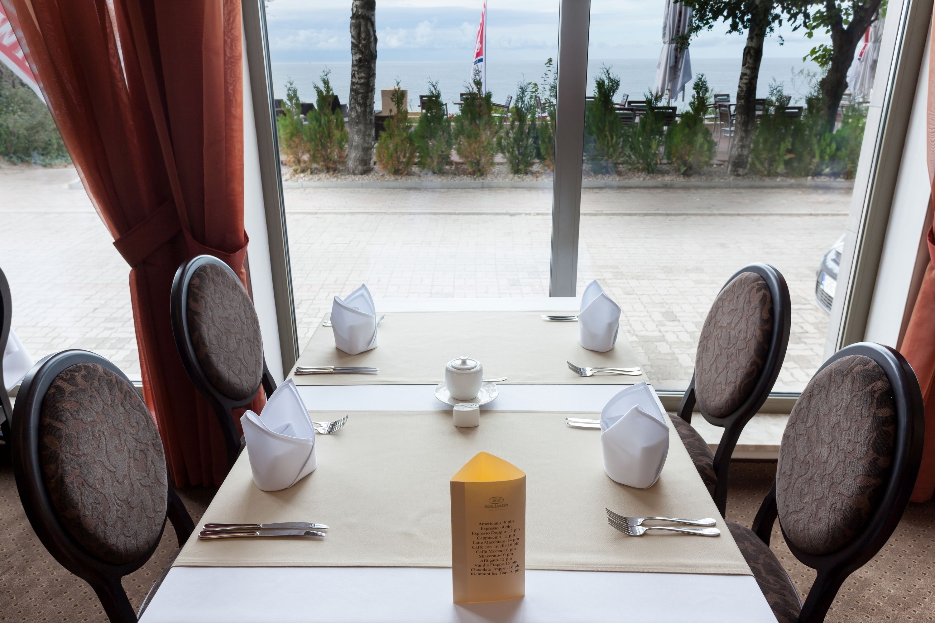 Breakfast, lunch, dinner served; Fusion cuisine, beach views 