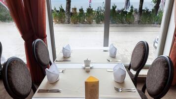 Breakfast, lunch, dinner served; Fusion cuisine, beach views