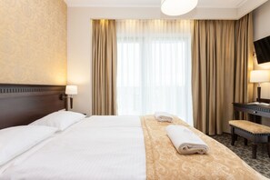 Suite Confort | Minibar, caja fuerte, escritorio y wifi gratis