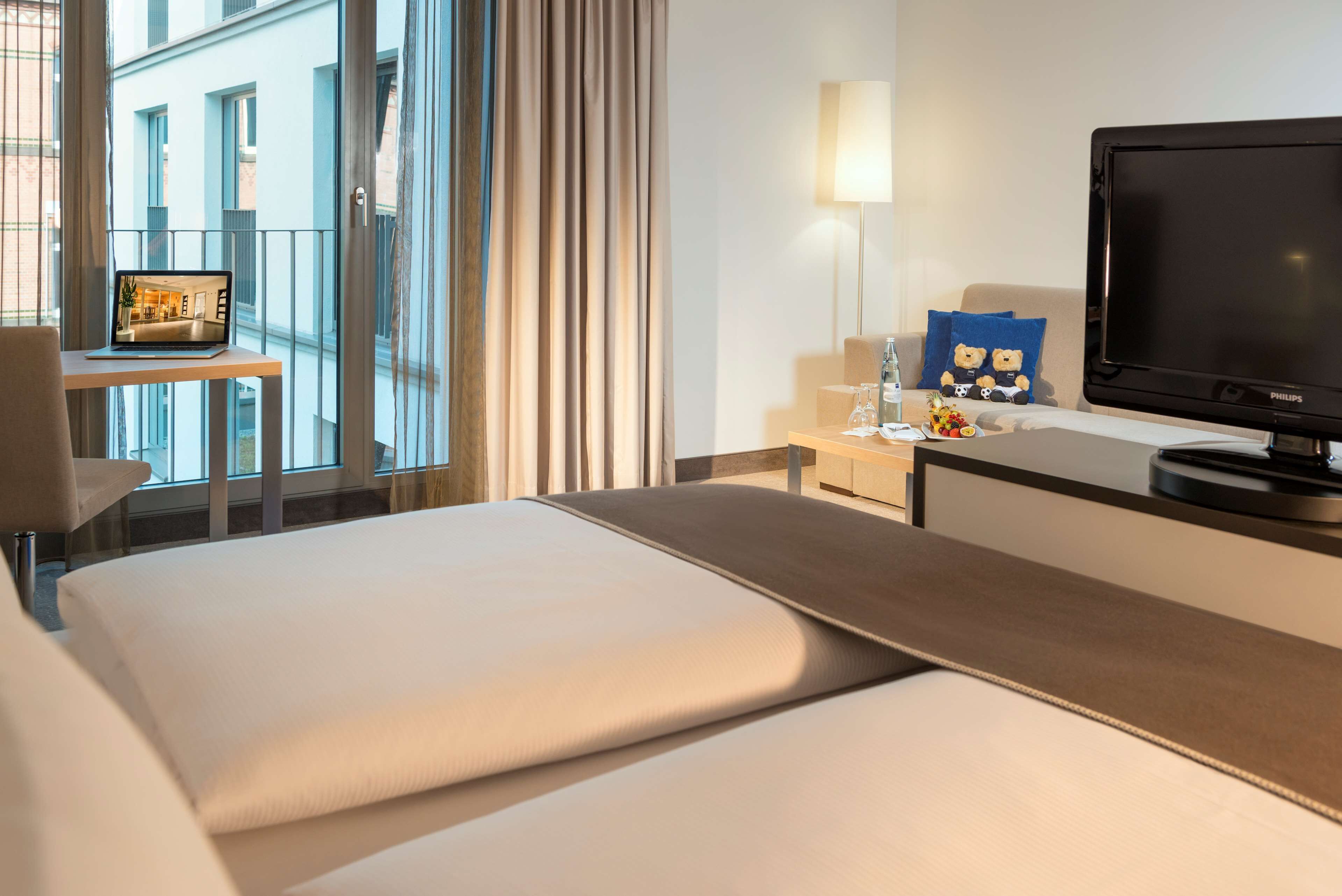 premium bedding, down duvets, pillow-top beds, in-room safe