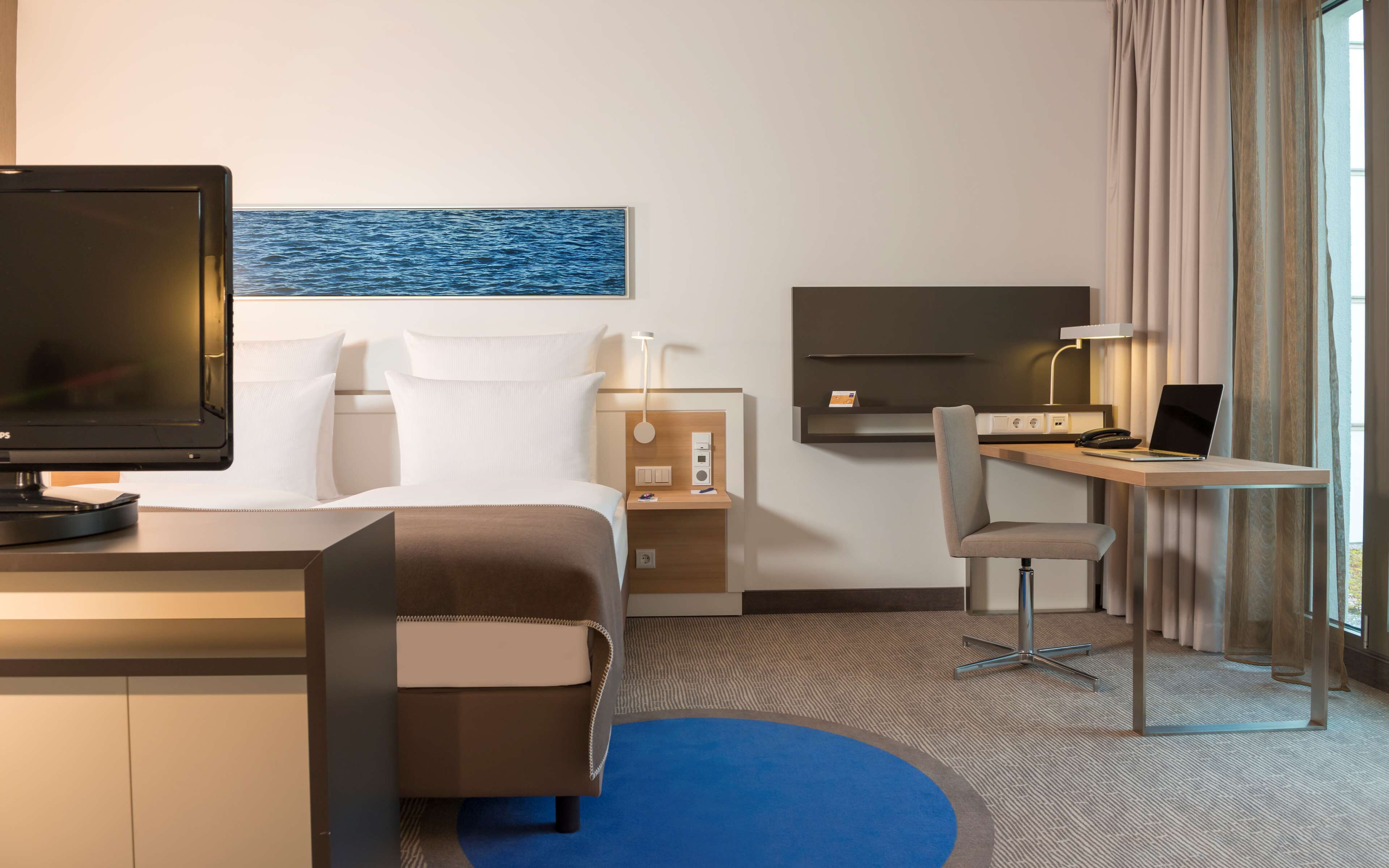 premium bedding, down duvets, pillow-top beds, in-room safe