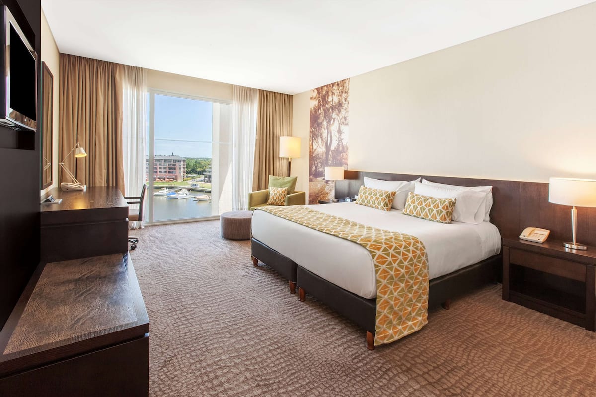 Premium bedding, down comforters, pillowtop beds, minibar