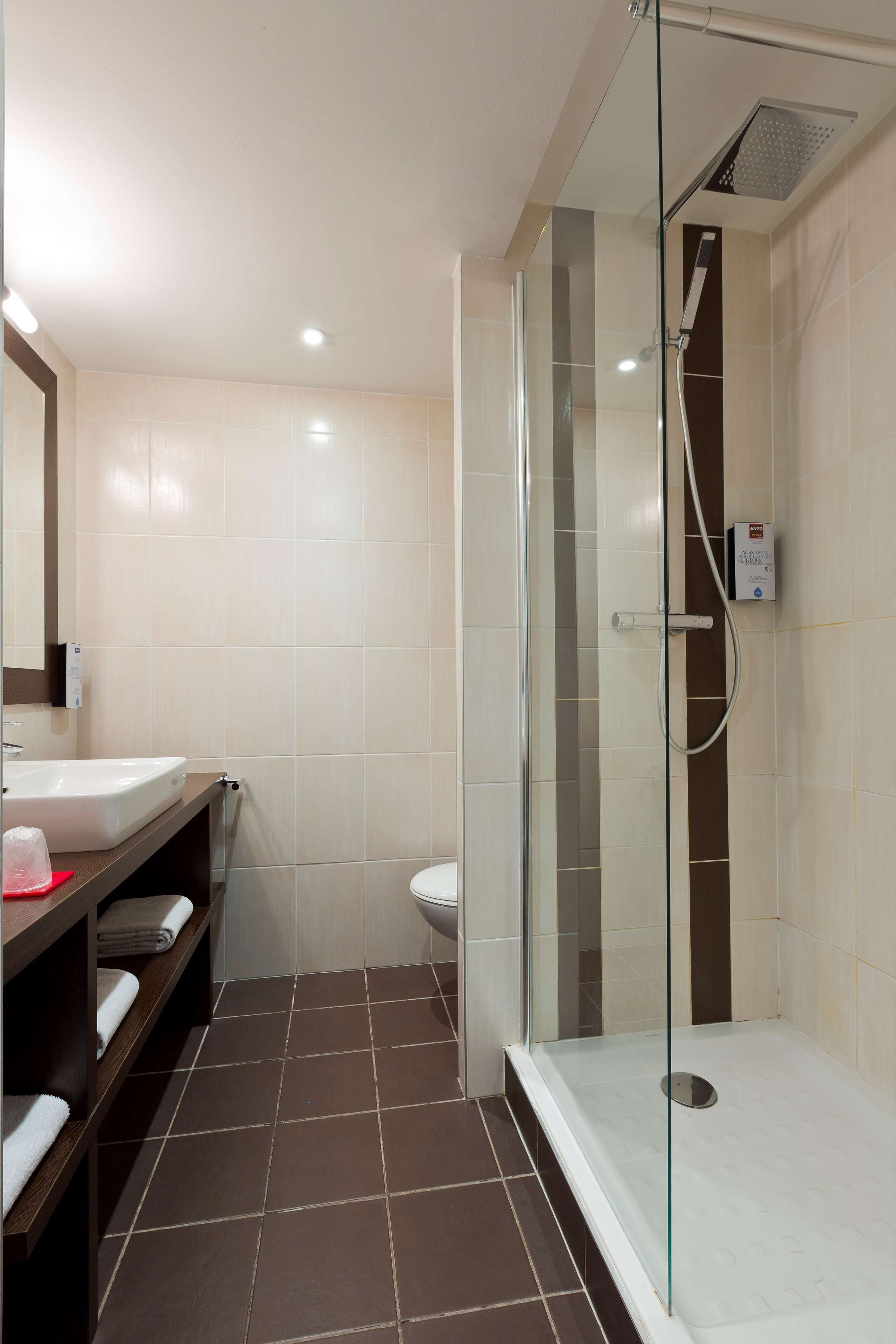 eco-friendly toiletries, hair dryer, towels