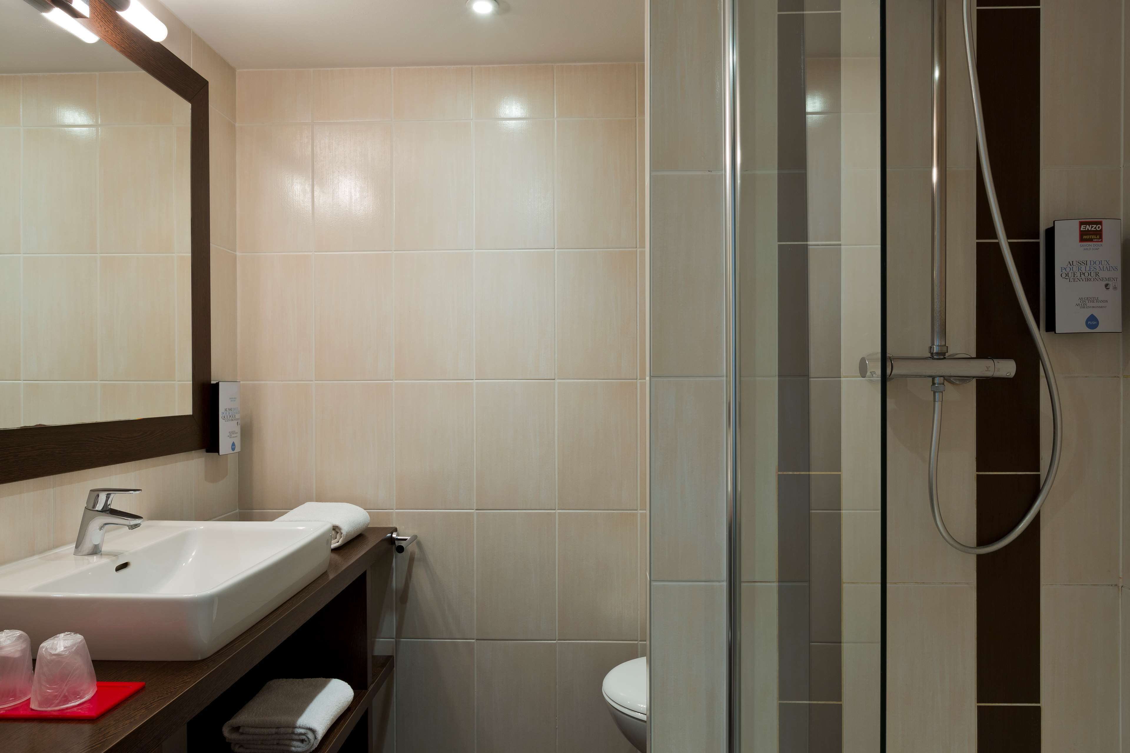 eco-friendly toiletries, hair dryer, towels