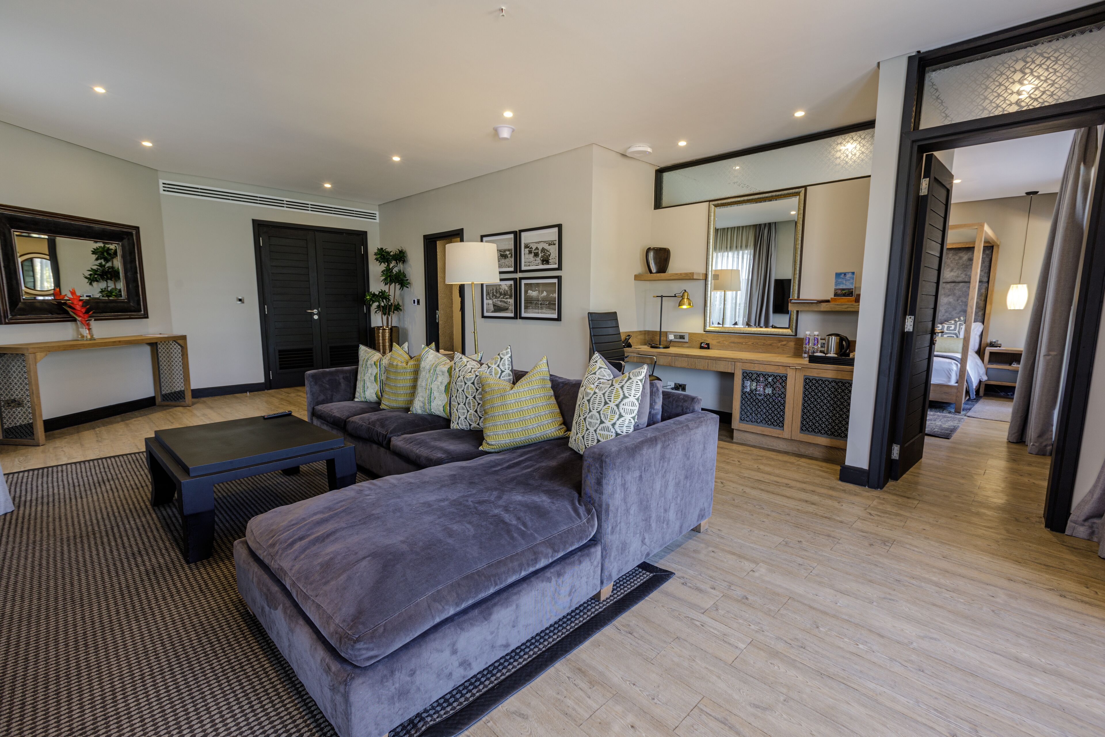 suite (amani) | living area | flat-screen tv