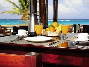 Breakfast, lunch, dinner served; beach views